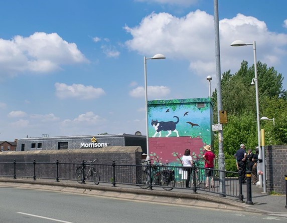 Batman, well-known for welcoming Metrolink passengers, has been awarded his own mural