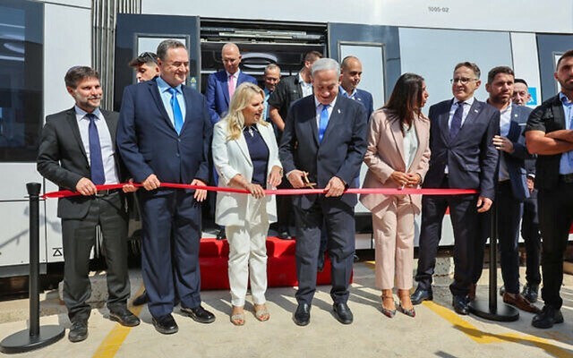 The ribbon-cutting ceremony for the Tel Aviv Red Line light rail. (NTA